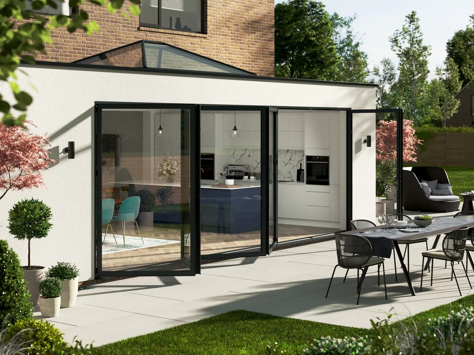 A five sash grey bifold part folded, seen from the garden of a rendered extension