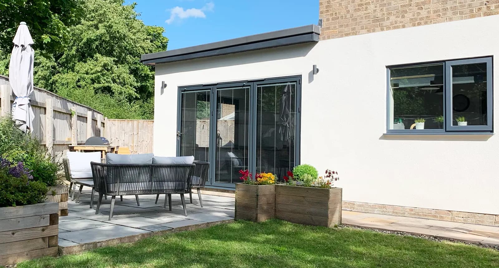 A finished Korniche bifold installation seen from the garden
