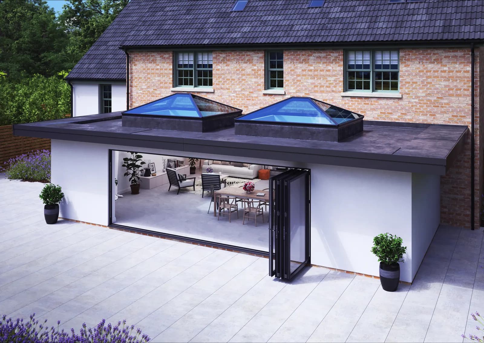 A house with two Korniche roof lanterns over an extension and bifold doors open onto the patio